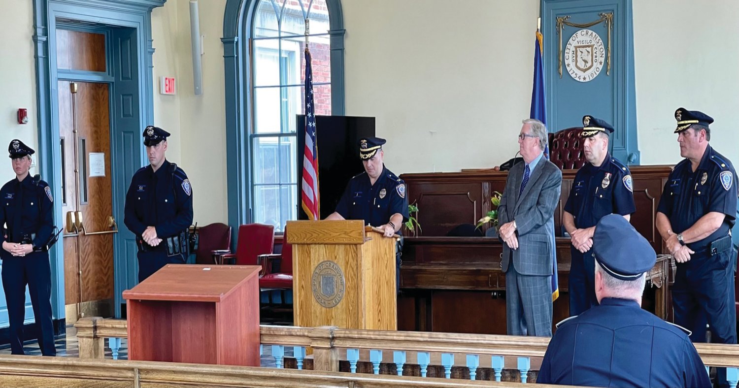 CRANSTON’S WELCOME: From left, new officers Kayleigh Cooper and Brian Brothers are joined by Col. Michael Winquist, Mayor Ken Hopkins and majors Todd Patalano and Robert Quirk during last week’s ceremony.